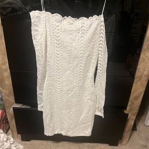 White lace off the shoulder white dress. A beautiful dress never worn size small